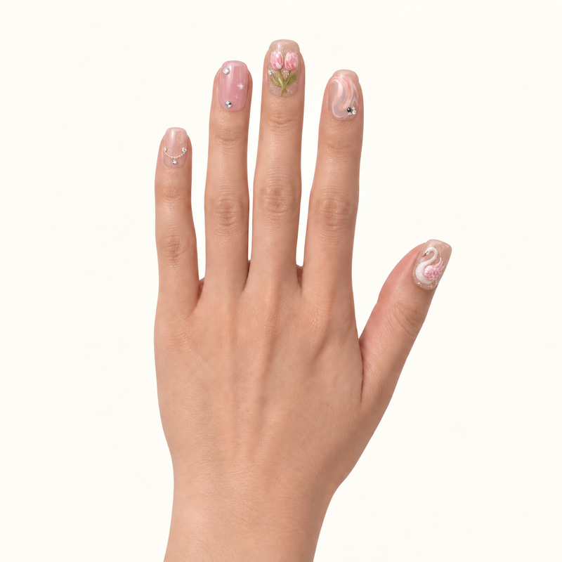 The same hand wearing a full set of AllSet press-on nails